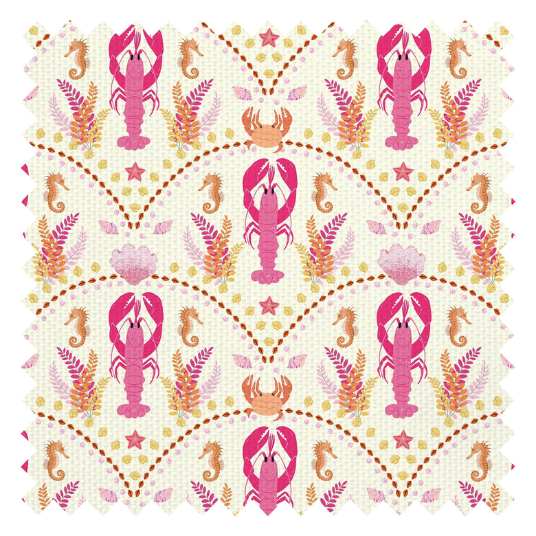 She's our Lobster Fabric in Pink and Orange on Cream
