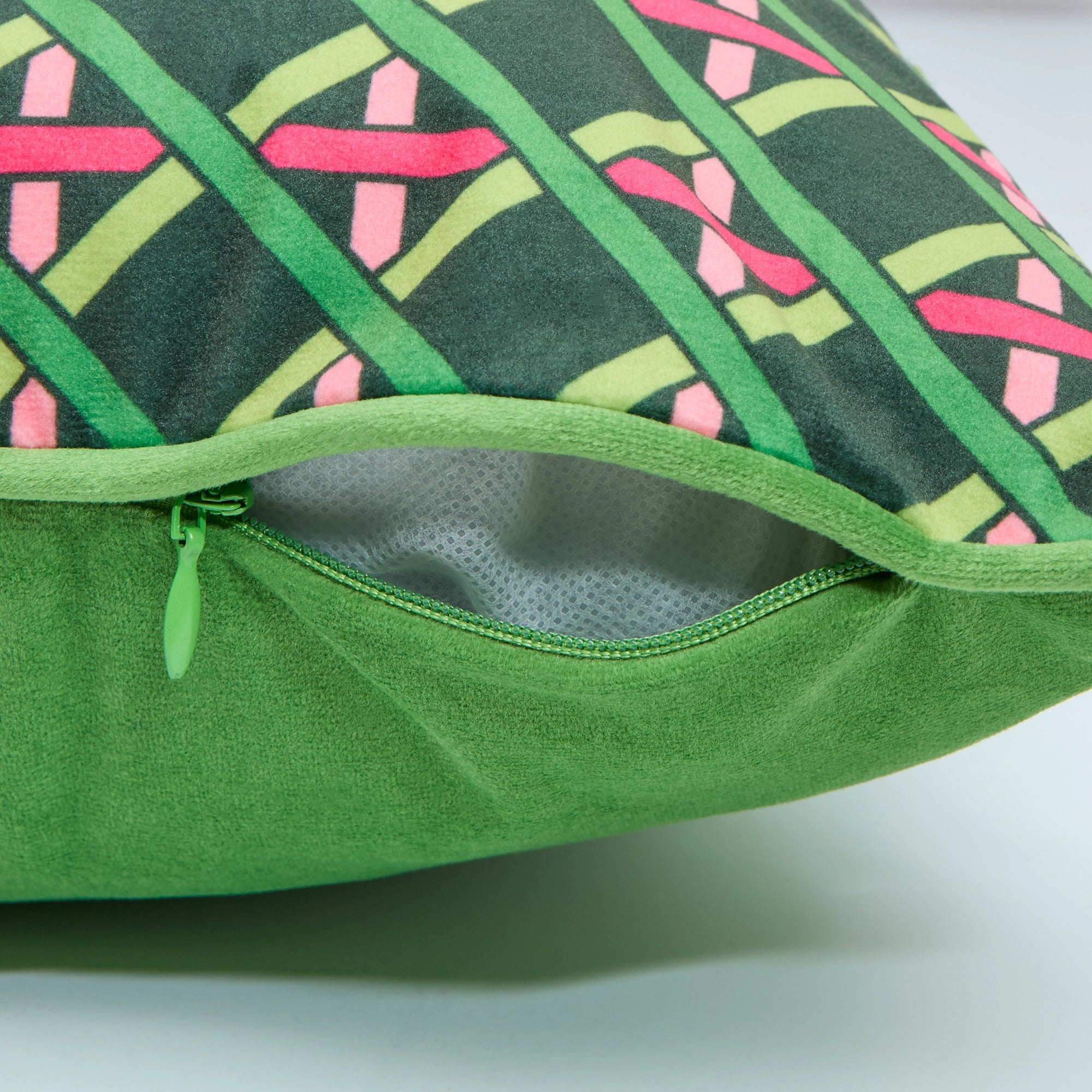 Criss Crossed Bolster Cushion in Greens, Pink & Orange
