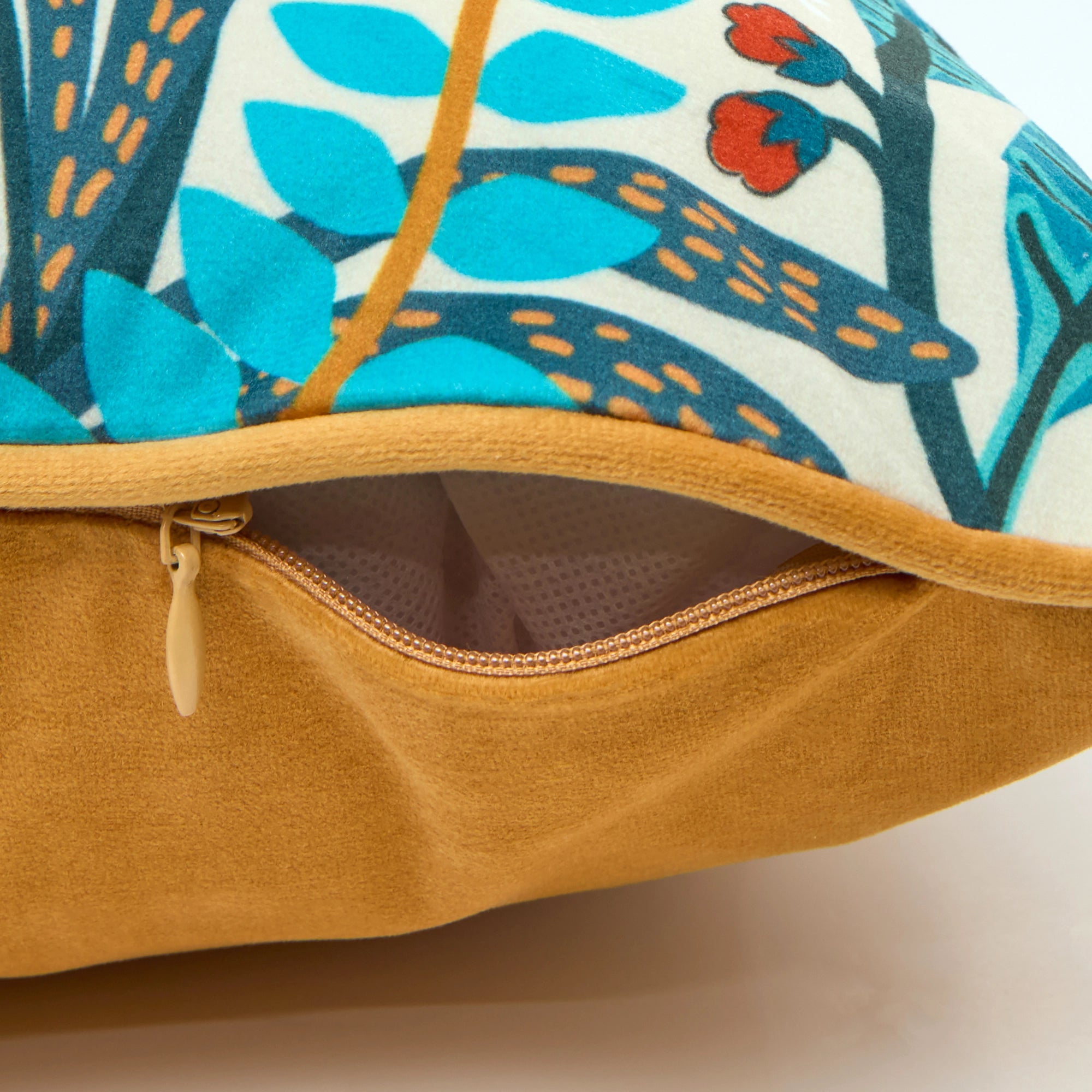 Eclectic Eden Bolster Cushion in Teal, Tan on Vintage Cream