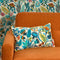 Eclectic Eden Bolster Cushion in Teal, Tan on Vintage Cream