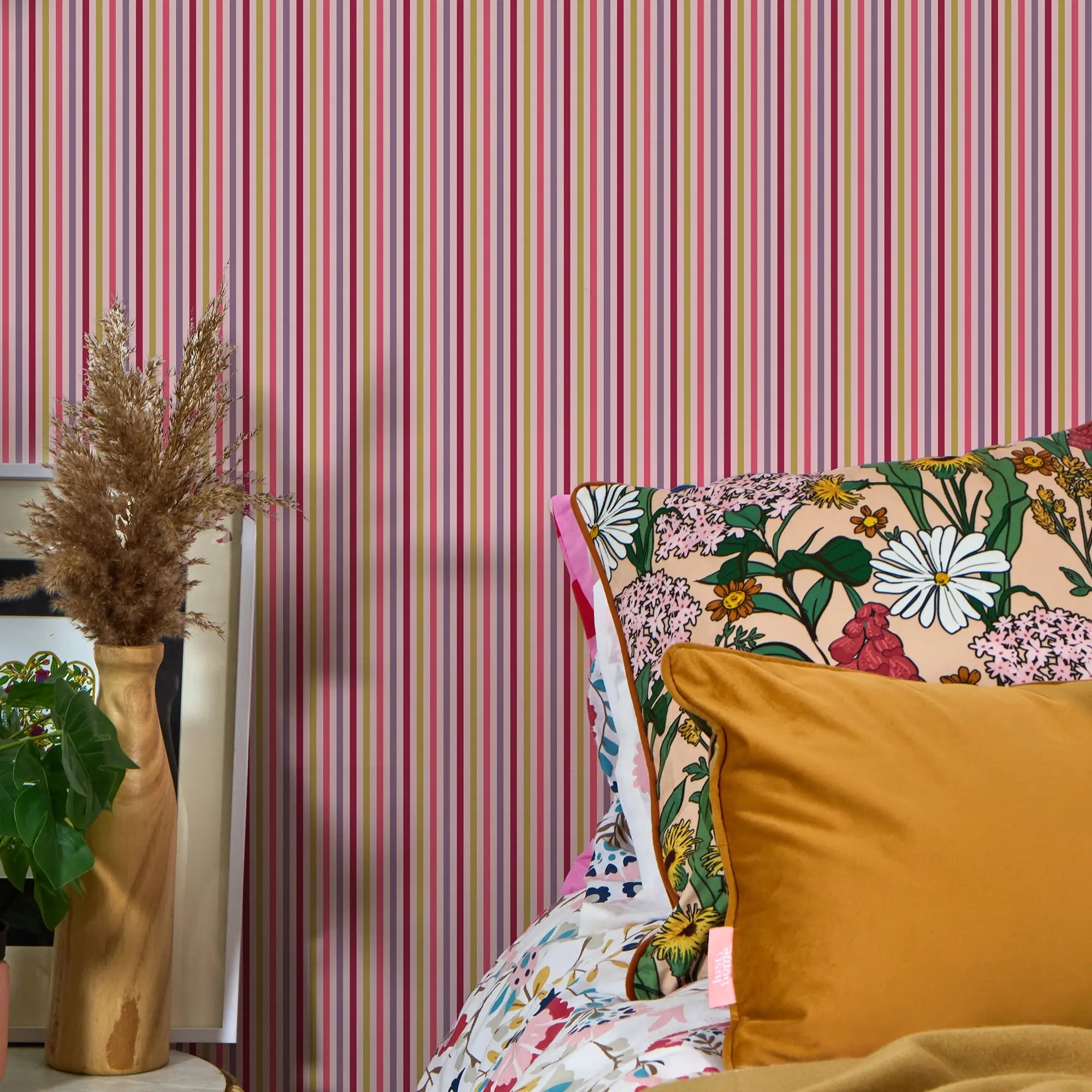 Fruit Salad Pinstripe Wallpaper in Multicoloured on Pink