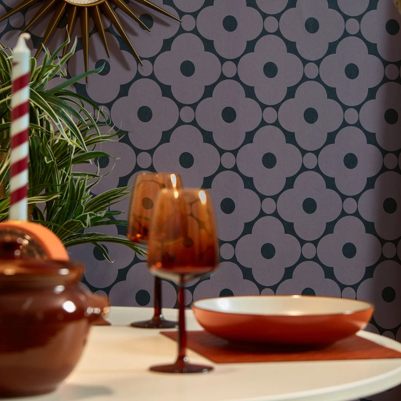 Roomset close-up of vintage flower petal, geometric wallpaper in charcoal grey and lavender colourway 