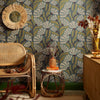 Roomset of matisse pattern wallpaper in walnut and wasabi green on teal colourway 