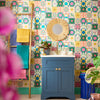 bright tile wallpaper in bathroom with navy sink
