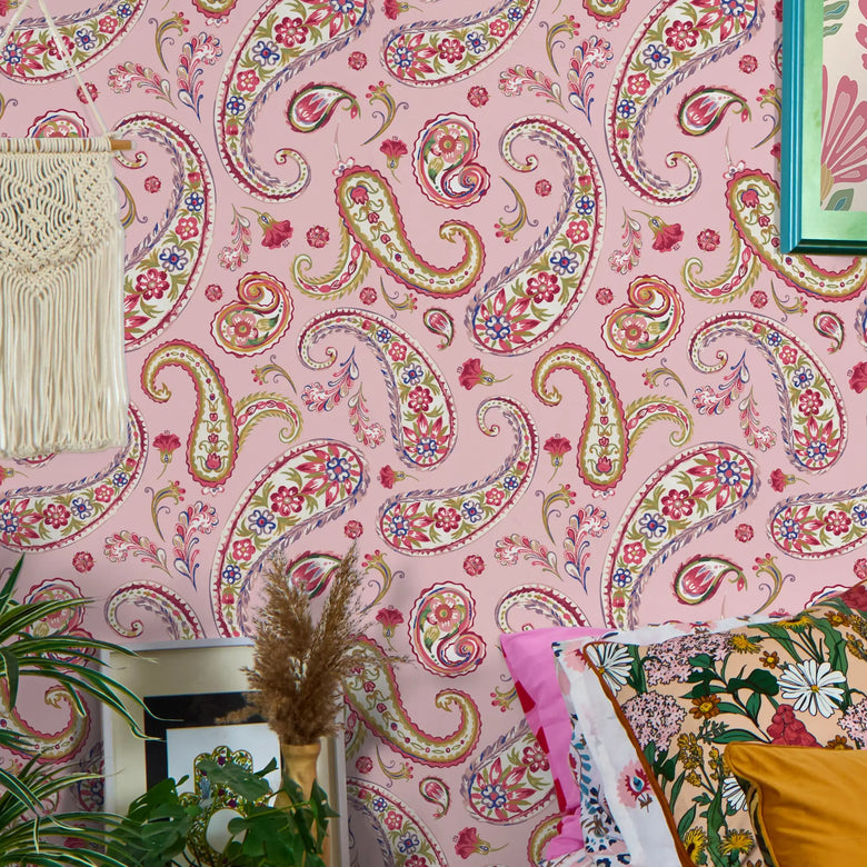 Paisley Passion Wallpaper in Reds and Soft Green on Pink
