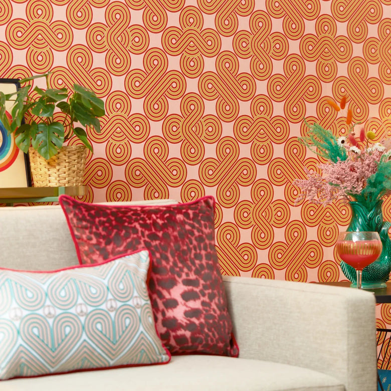 Roomset of 70s geometric wallpaper in mustard, red and subtle pink colourway 
