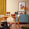 Get A Wiggle On Wallpaper in Mustard and Millennial Pink