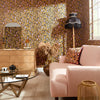 Leopard print living room wallpaper in ochre and pink